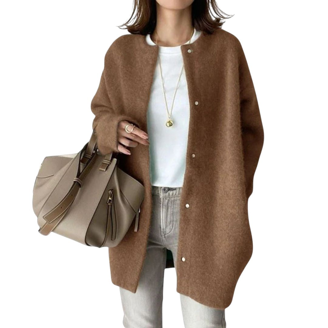 jardi-4 brown longline knit cardigan with open front and long sleeves worn over a white top and grey jeans